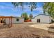 Expansive backyard with a combination of gravel, concrete and brick pavers, offering a versatile outdoor space at 2122 W Virginia Ave, Phoenix, AZ 85009