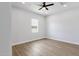 Bedroom featuring a ceiling fan and window providing ample natural light at 2122 W Virginia Ave, Phoenix, AZ 85009