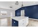 Bright, open-concept living room boasts a kitchen island and recessed lighting at 2122 W Virginia Ave, Phoenix, AZ 85009