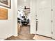 Bright home office featuring a ceiling fan, desk, multiple monitors, and natural light at 21667 S 225Th Way, Queen Creek, AZ 85142