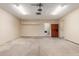 Spacious garage provides ample parking and storage, featuring convenient access to the laundry room at 2210 W Tonto Ln, Phoenix, AZ 85027