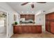 A kitchen featuring granite counters, stainless steel appliances and custom cabinetry at 2210 W Tonto Ln, Phoenix, AZ 85027