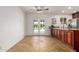 A spacious kitchen with tile floors, featuring stainless appliances and an outdoor view at 2210 W Tonto Ln, Phoenix, AZ 85027
