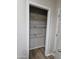 Organized closet with shelving and rack that maximizes space, providing convenient storage solutions at 2233 E Behrend Dr # 203, Phoenix, AZ 85024