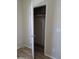 This bedroom features an open closet with a hanging rack at 2233 E Behrend Dr # 203, Phoenix, AZ 85024