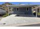 Charming single-level home featuring desert landscaping and covered parking space with disability access at 2233 E Behrend Dr # 203, Phoenix, AZ 85024