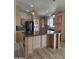 Well-equipped kitchen with an island and appliances, ideal for cooking at 2233 E Behrend Dr # 203, Phoenix, AZ 85024