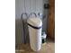 Water softener system installed indoors with blue accents and paint cans at 2233 E Behrend Dr # 203, Phoenix, AZ 85024