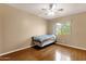 Bedroom with light flooring and a bright window, providing natural light at 2338 W Lindner Ave # 52, Mesa, AZ 85202