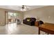 Inviting living room with access to the private backyard and neutral paint and flooring at 2338 W Lindner Ave # 52, Mesa, AZ 85202