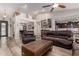 Open-concept living room featuring stylish furniture, recessed lighting, and access to other rooms at 27007 N 20Th Ln, Phoenix, AZ 85085