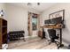 Functional office space featuring a modern desk, comfortable chair, and natural light from the window at 27007 N 20Th Ln, Phoenix, AZ 85085