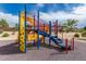 Colorful community playground with slides and climbing structures, perfect for outdoor activities at 27007 N 20Th Ln, Phoenix, AZ 85085