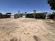 Spacious backyard with ample potential for creating an outdoor oasis and includes a storage shed at 2937 W Marshall Ave, Phoenix, AZ 85017