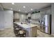 Well-lit kitchen showcasing updated cabinetry, stainless steel appliances, and granite countertops at 2991 E Fandango Dr, Gilbert, AZ 85298