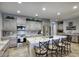 Bright kitchen featuring granite countertops, stainless steel appliances, and breakfast bar seating at 2991 E Fandango Dr, Gilbert, AZ 85298
