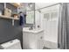 Updated bathroom features a white vanity, modern fixtures, and white subway tile in shower and around window at 3038 E Avalon Dr, Phoenix, AZ 85016