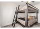 Bedroom with a modern bunk bed, ideal for or guests, features a geometric rug at 3038 E Avalon Dr, Phoenix, AZ 85016