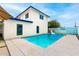 Refreshing pool with a playful unicorn float and a view of the home's exterior at 3038 E Avalon Dr, Phoenix, AZ 85016