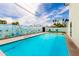 Tranquil pool with a mural and lounge seating, perfect for relaxing and enjoying the outdoor space at 3038 E Avalon Dr, Phoenix, AZ 85016