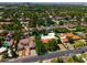 Aerial view of a residential area featuring houses with well-maintained yards and mature trees at 31 W Marlette Ave, Phoenix, AZ 85013