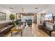 Classic living room features paneled walls, hardwood floors, leather furniture, and stylish decor at 31 W Marlette Ave, Phoenix, AZ 85013
