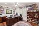 Dedicated office space with a large desk, hardwood floors, and a bright window for natural light at 31 W Marlette Ave, Phoenix, AZ 85013