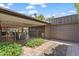 Charming outdoor patio featuring a dining area, wine bar, and manicured garden, perfect for entertaining guests at 31 W Marlette Ave, Phoenix, AZ 85013