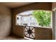Balcony with black metal railing overlooking the apartment complex and surrounding greenery at 3236 E Chandler Blvd # 2028, Phoenix, AZ 85048