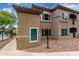 Exterior view showcasing the well-maintained grounds of the condominium building at 3236 E Chandler Blvd # 2028, Phoenix, AZ 85048