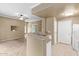 Bright kitchen with breakfast bar, modern appliances, and tile flooring at 3236 E Chandler Blvd # 2028, Phoenix, AZ 85048