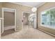 Living room with a sliding glass door leading to a balcony and view to living space at 3236 E Chandler Blvd # 2028, Phoenix, AZ 85048