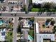 Aerial view of a residential area showcasing various homes, tree-lined streets, and neighborhood amenities at 3404 N Kachina Ln, Scottsdale, AZ 85251