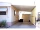 Attached carport with space for parking and a storage shed, blending convenience with practicality at 345 S 58Th St # 10, Mesa, AZ 85206