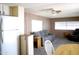 Open living space with comfortable seating, a ceiling fan, and ample natural light at 345 S 58Th St # 10, Mesa, AZ 85206