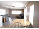 Living room boasts neutral-toned furniture, including a plush sofa and leather armchair at 345 S 58Th St # 10, Mesa, AZ 85206