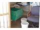 Interior view of storage shed, equipped with shelving and storage containers at 345 S 58Th St # 10, Mesa, AZ 85206