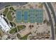 Community aerial view featuring tennis courts, bocce ball, pickleball, and a pool at 3640 E Torrey Pines Ln, Chandler, AZ 85249