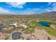 Wide aerial view showcasing the golf course and pool in this expansive community at 3640 E Torrey Pines Ln, Chandler, AZ 85249