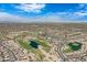 Stunning aerial view showcasing the expansive golf course and residential area of the community at 3640 E Torrey Pines Ln, Chandler, AZ 85249