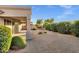 Inviting backyard area featuring low-maintenance landscaping and a covered patio, perfect for relaxing or entertaining outdoors at 3640 E Torrey Pines Ln, Chandler, AZ 85249
