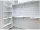 Walk-in closet with carpet and multiple levels of shelving and closet rods at 3640 E Torrey Pines Ln, Chandler, AZ 85249