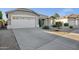 Charming single-story home featuring a two car garage and low maintenance desert landscaping at 3640 E Torrey Pines Ln, Chandler, AZ 85249