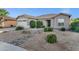 Charming single-story home featuring a two car garage and low maintenance desert landscaping at 3640 E Torrey Pines Ln, Chandler, AZ 85249