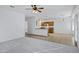Spacious living room flowing into a kitchen featuring tile flooring and ample natural light at 3640 E Torrey Pines Ln, Chandler, AZ 85249