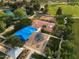 Enjoy this aerial view of a park with a playground, basketball court and lake with walking paths at 3773 E Stampede Dr, Gilbert, AZ 85297