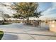 Gather around the tree next to the lake for a peaceful time. Fishing permits required at 3773 E Stampede Dr, Gilbert, AZ 85297