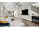 Open-concept living area with sightlines to the kitchen, and plenty of room to gather around the TV at 3773 E Stampede Dr, Gilbert, AZ 85297