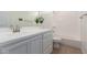Well-lit bathroom showcasing a vanity with modern fixtures and a bathtub-shower combination at 3856 E Shannon St, Gilbert, AZ 85295