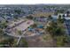 Scenic aerial view of community park with playgrounds, sports field and lush green spaces surrounded by neighborhood at 4033 W Sharon Ave, Phoenix, AZ 85029